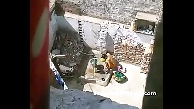 Nude desi woman bathing hidden record by young neighbour